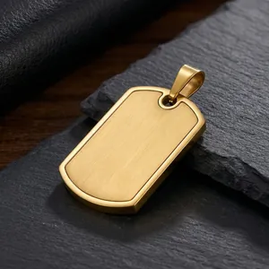 Detailed view of a golden stainless steel dog tag pendant featuring a brushed metal texture.