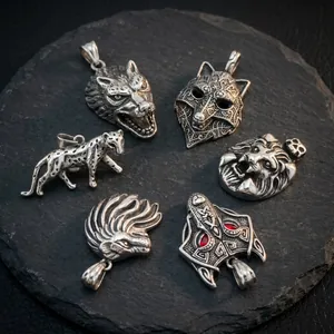 Collection of Norse mythology inspired animal head pendants in vintage stainless steel.