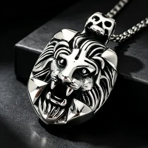 Detailed macro view of vintage stainless steel lion head pendant with fierce expression