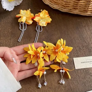 Elegant yellow fabric flower tassel earrings with rhinestones for beach vacations