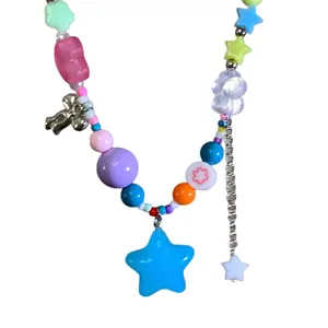 Summer dopamine style colorful beaded necklace with large blue star charm and flower beads