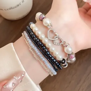 Set di Braccialetti Multistrato Bohemien Perla Artificiale Strass Ciondolo a Cuore Braccialetti Elastici di Perline Gioielli da Donna Regalo