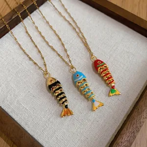 Trendy gold-plated necklace with colorful creative fish bone pendants for elegant women's style.