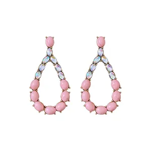 Elegant retro teardrop dangling earrings featuring pink stones and iridescent crystals