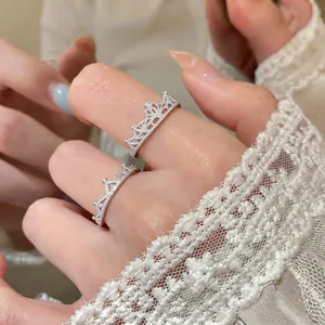 Elegant silver crown lace ring with intricate crystal detailing for women.