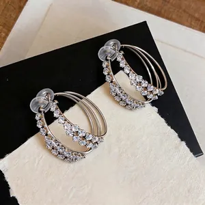 Sparkling cubic zirconia double hoop clip-on earrings for non-pierced ears, silver finish