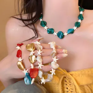 Detailed view of colorful shell and starfish beaded necklaces for beach vacation