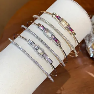 18k gold plated double-layer rectangular link bracelets with multi-colored cubic zirconia.