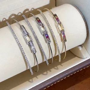 Elegant 18k gold plated double-layer bangle set with rectangular cubic zirconia stones