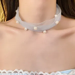 Sweet light blue mesh choker necklace with white pearls for an elegant feminine look