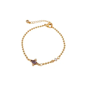 Vintage gold ball chain bracelet featuring a purple diamond zircon charm and extension chain.