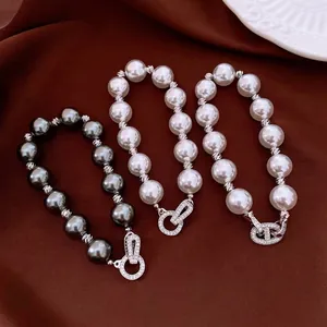 Vintage Künstliche Perlenarmband Für Damen Luxus Zirkonia Verriegelungsschnalle Geometrische Perlen Handschmuck Elegante Handkette