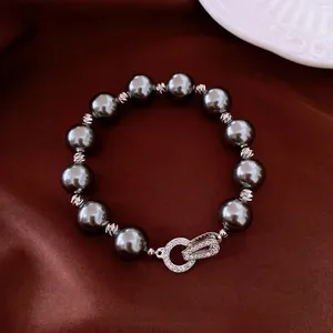 Vintage Armband mit dunkelgrauen Perlen und einem luxuriösen Zirkonia-Verschluss