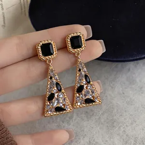Orecchini pendenti geometrici dorati vintage stile francese con pietre nere e diamanti