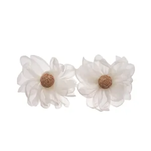 Handmade white chiffon flower earrings with raffia woven center for vacation style