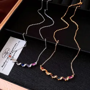 Elegant gold and silver twisted bar necklaces set with vibrant multi-color oval gemstones