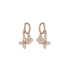 Elegant rose gold earrings featuring zircon studded floral charms and beaded hoops