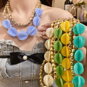 Double-layer chunky acrylic bead necklace set in vibrant colors for a chic vacation look