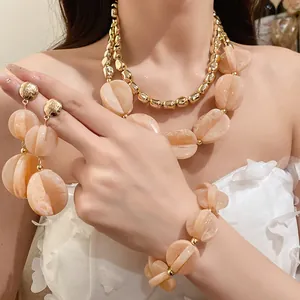 Detail view of premium acrylic double-layer necklace and earring set with marble pattern