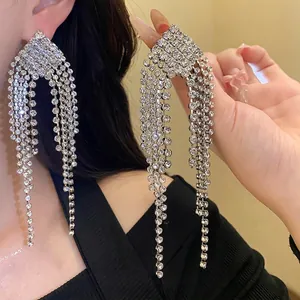 Elegant silver needle rhinestone tassel earrings with sparkling rhombus fringe design.