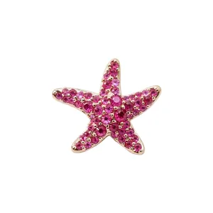 Élégante boucle d'oreille clip étoile de mer en zircon rose rouge et finition dorée