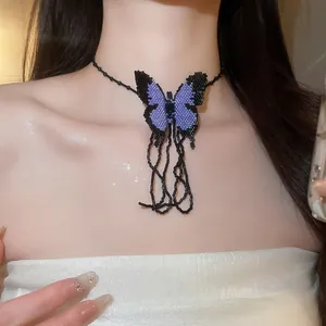 Detail of a handmade purple and black beaded butterfly choker necklace for women