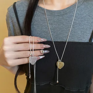 Elegant hollow heart pendant adjustable necklace in polished gold and silver finishes