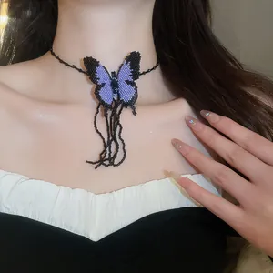 Close-up view of a unique purple and black beaded butterfly choker necklace on a model.