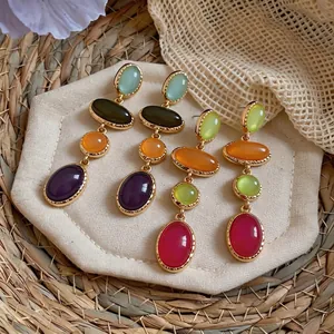 Vintage resin oval drop earrings with colorful geometric stones and gold-tone finish