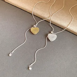 Elegant hollow heart pendant adjustable necklace in gold and silver finishes for women