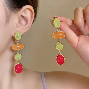 Vintage palace style colorful resin oval drop earrings with elegant gold-tone metal finish