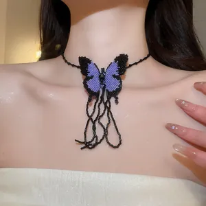 Detailed view of a handmade purple and black beaded butterfly choker on a neck