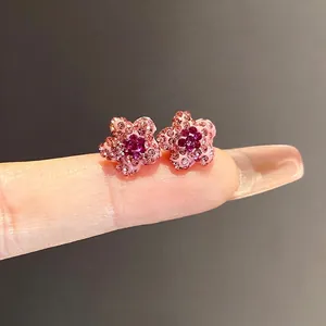 Elegant pink polymer clay flower stud earrings with sparkling rhinestones decoration