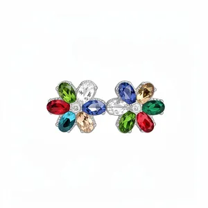 Vibrant multi-colored gemstone flower stud earrings featuring an elegant silver-tone setting