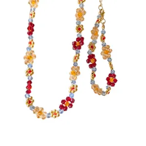 Elegant handcrafted beaded necklace and bracelet jewelry set with colorful crystal flower patterns