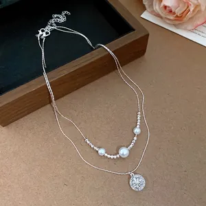 Elegant silver double-layer necklace with white pearls and star zircon pendant for women