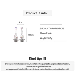 Detail view of colorful resin unicorn and star earrings with dimensions and weight info