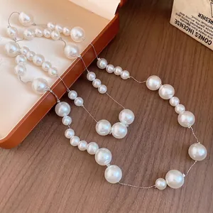 Vintage French pearl beaded necklace with varying sized pearls on silver chain