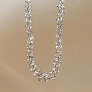 Elegant minimalist crystal flower choker necklace for women featuring sparkly floral petals