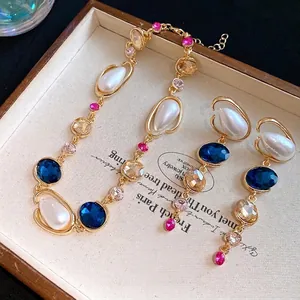 Set di collana e orecchini vintage in stile francese con cristalli e perle a goccia