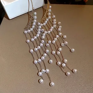 Elegant pearl tassel ear cuffs featuring vintage gold and silver chain design for women