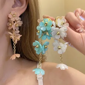 Elegant acrylic flower tassel earrings with three-dimensional floral clusters design