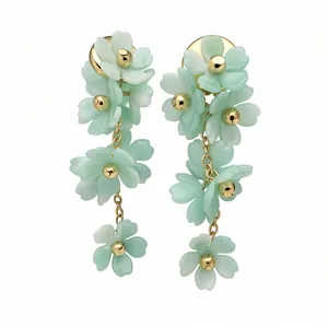 Elegant light green acrylic flower tassel earrings with gold-tone metal drop chains