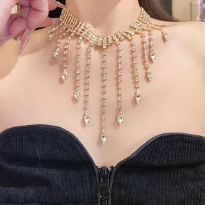 Elegant gold-tone fringe choker necklace with sparkling rhinestones and water drop charms