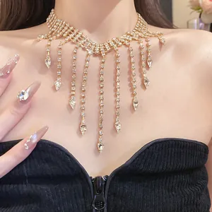 Detailed macro view of a luxury rhinestone tassel choker with sparkling teardrop pendants
