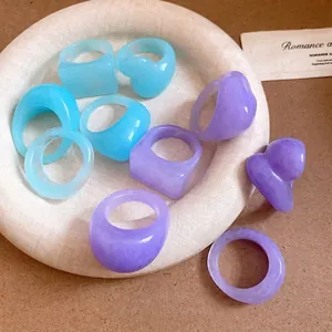 Trendy minimalist chunky resin geometric rings set in pastel blue and lavender purple for women