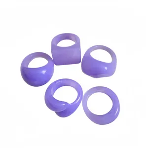 Elegant set of five purple resin geometric rings in various minimalist shapes for daily wear