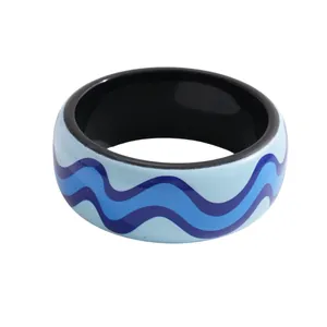 Stylish colorful resin bangle bracelet with blue wave pattern and dopamine fashion style