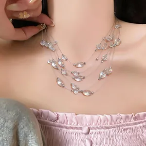 Detailed close-up of a bohemian multi-layered clear crystal beaded choker necklace