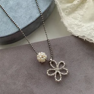 Elegant Korean style pearl flower pendant necklace with a minimalist silver-toned ball chain.